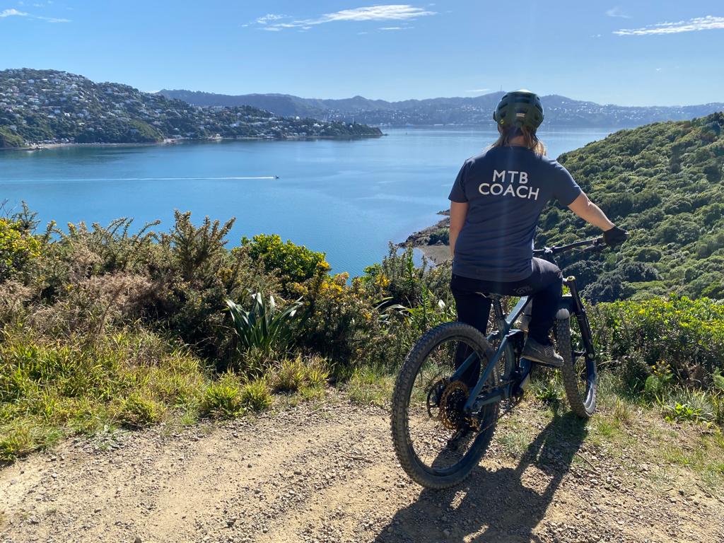 Nic Johnson MTB Coach looking over the Wellington Harbour. About Nic