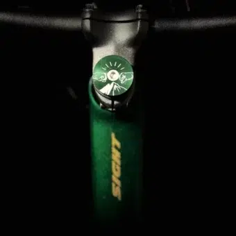 Forest Green OG fist bump stem cap. Look good, feel good, do good.