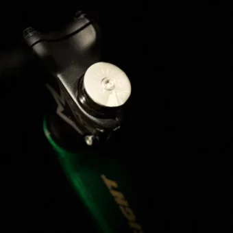 Stealth Silver OG fist bump stem cap. Look good, feel good, do good. Merch.