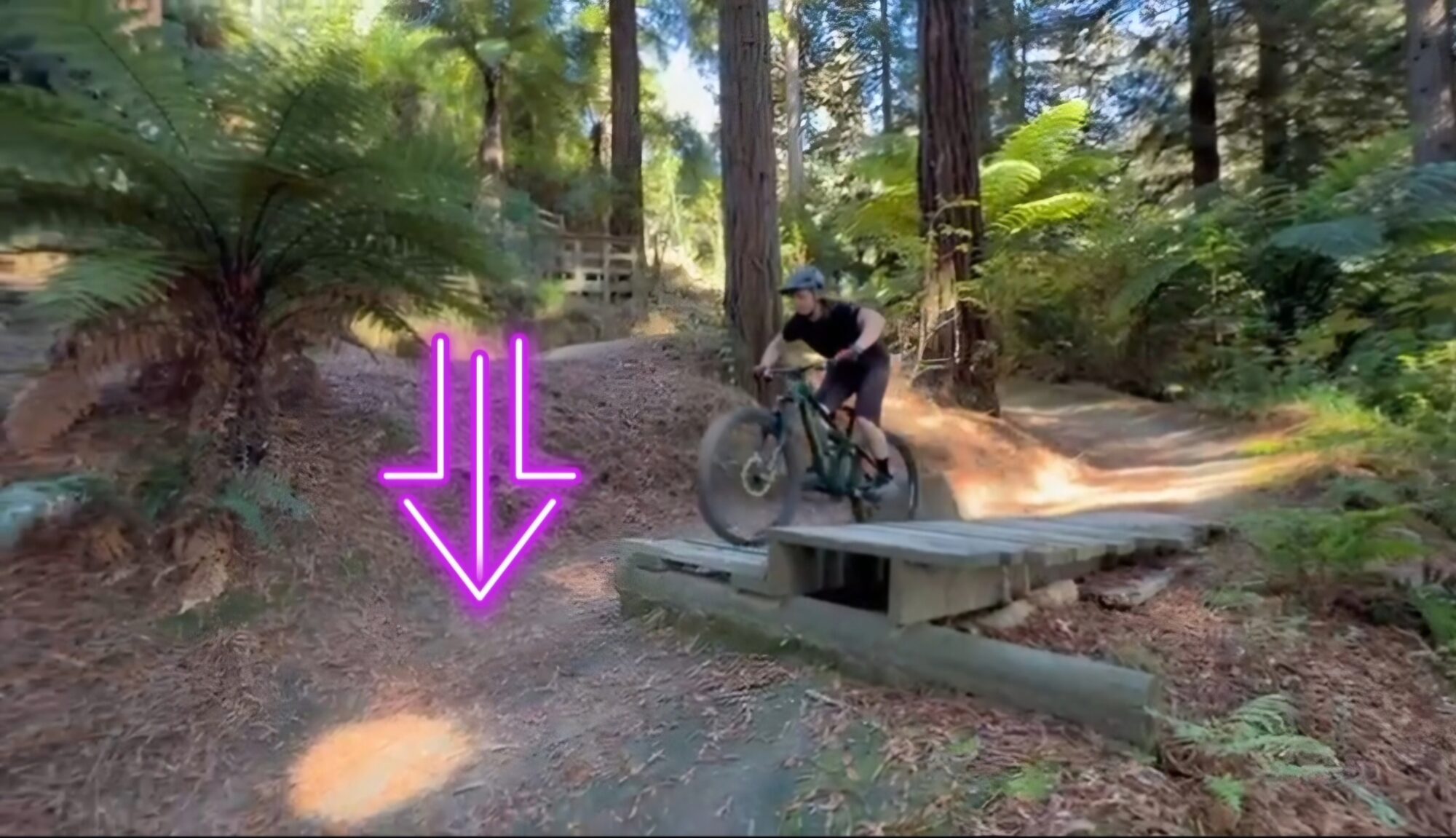 Nic Johnson riding a bike on a trail, showing the Peek and Push method